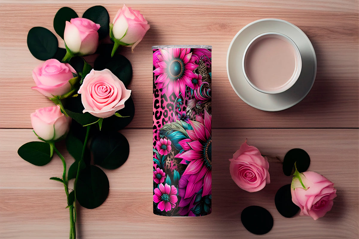 20oz pink tumbler with vibrant floral and leopard print design by Macies Handmade Treasure's on wooden table