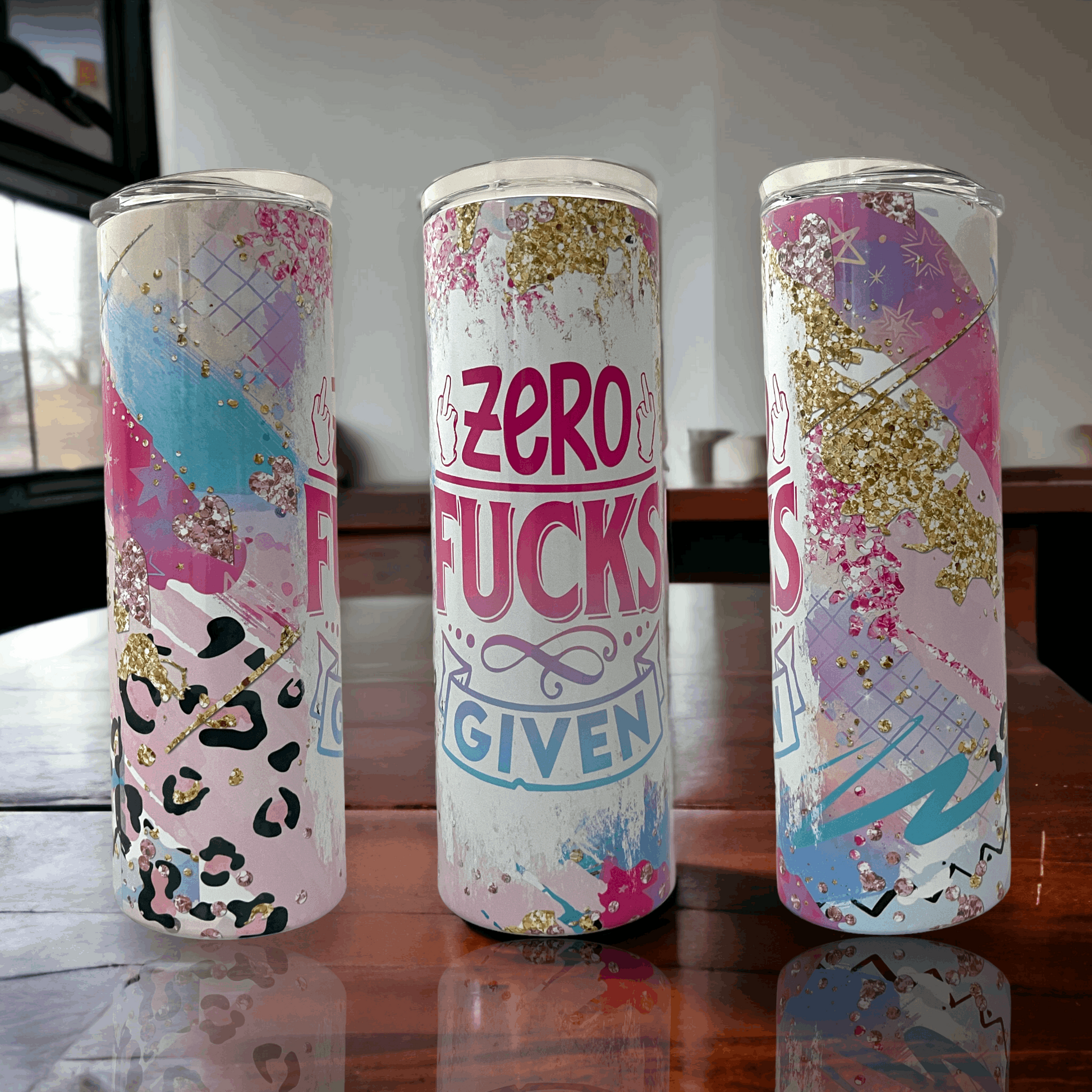 20oz Yeti tumbler yeti with colorful pink blue and gold glitter leopard design personalized with zero fucks given text