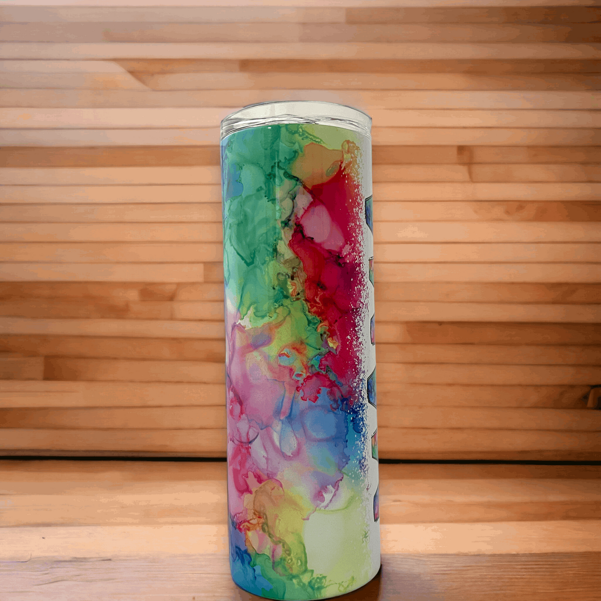Side view of 20 oz tumbler with abstract watercolor pattern