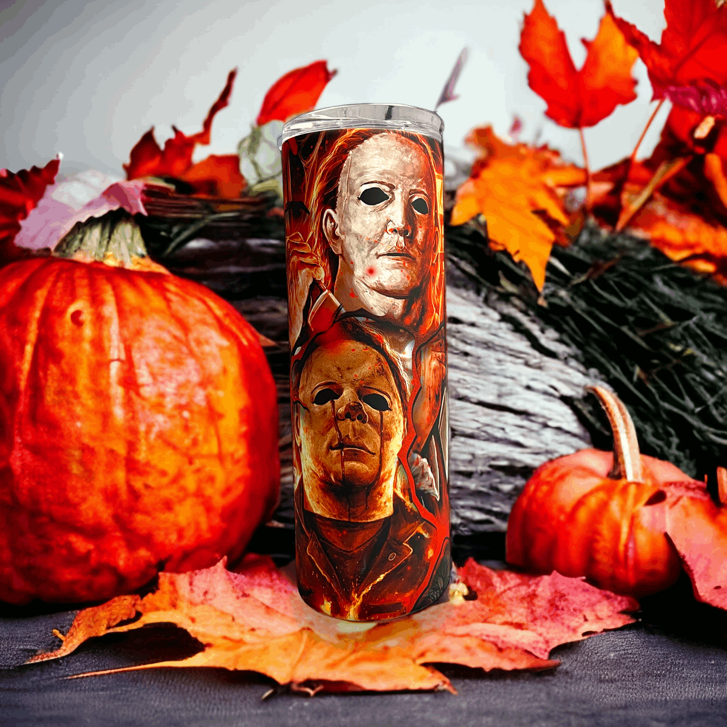 20oz tumbler by Macies Handmade Treasures featuring michael myers in halloween design with pumpkins and autumn leaves