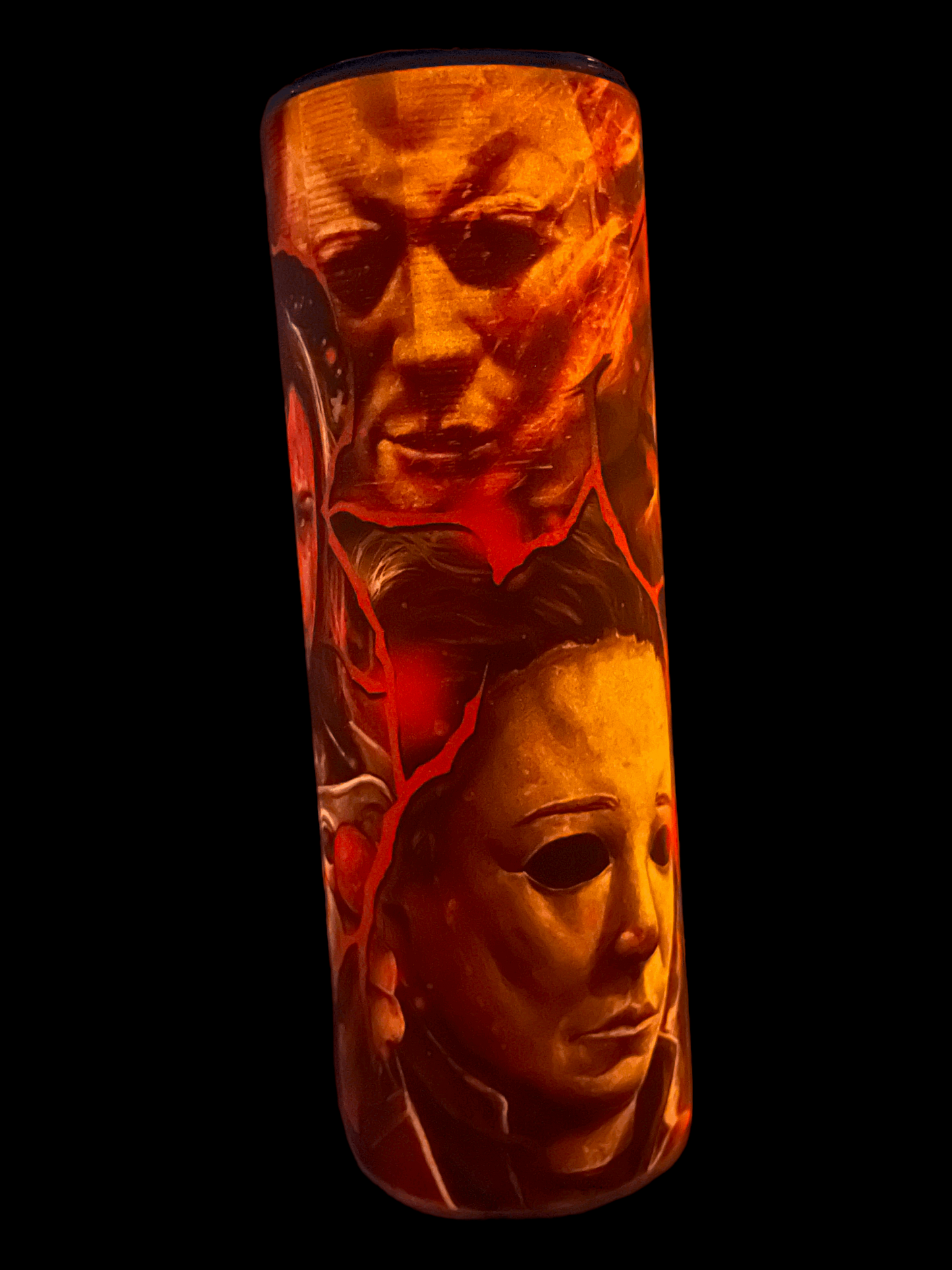 20oz Tumbler by Macies Handmade Treasure's featuring artwork of michael myers in halloween with fiery orange and red tones