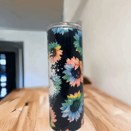 Close-up of floral #MomLife design on black 20 oz tumbler
