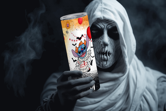 Stanley halloween tumbler 20oz featuring a colorful spooky design held by a person in ghost costume