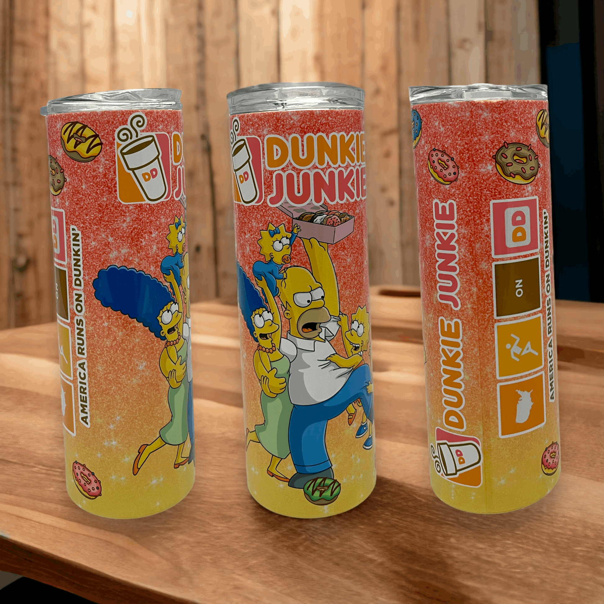 20oz tumbler featuring the simpsons Dunkin Junkie design with colorful donut and coffee graphics