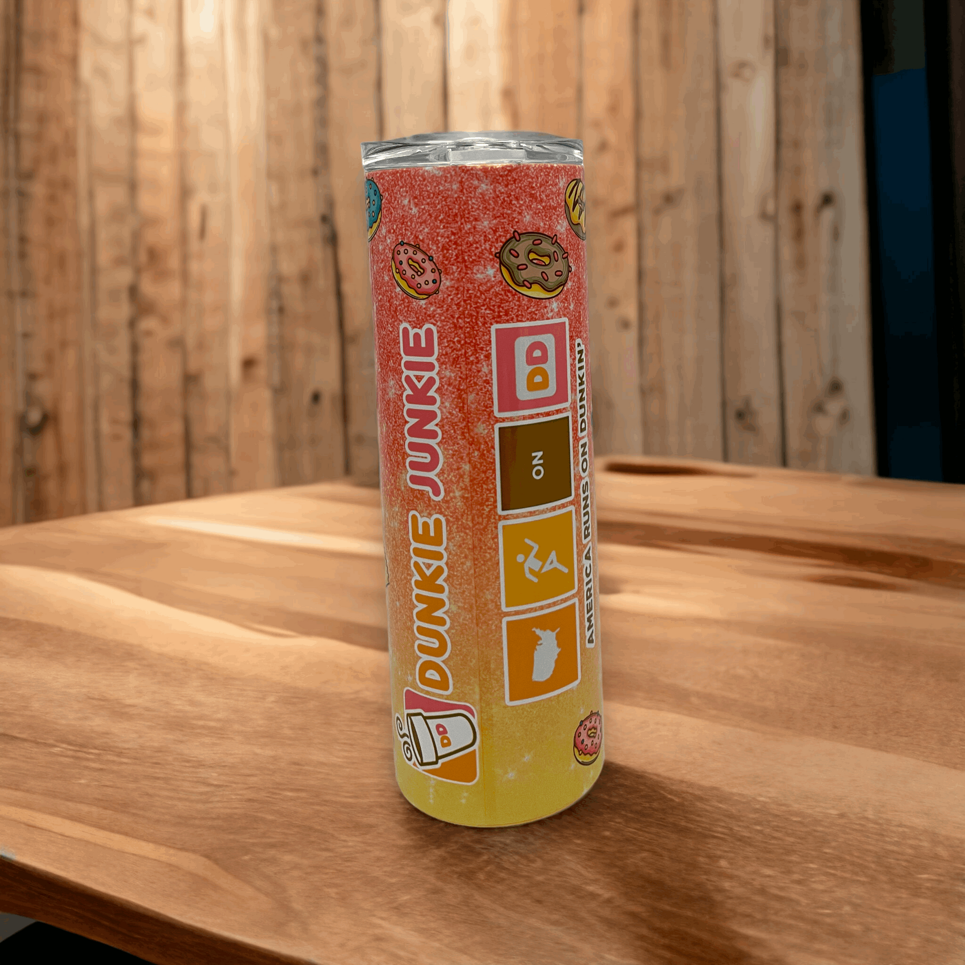 20oz tumbler with Dunkin' Donuts inspired colorful design featuring donuts and Dunkie Junkie text